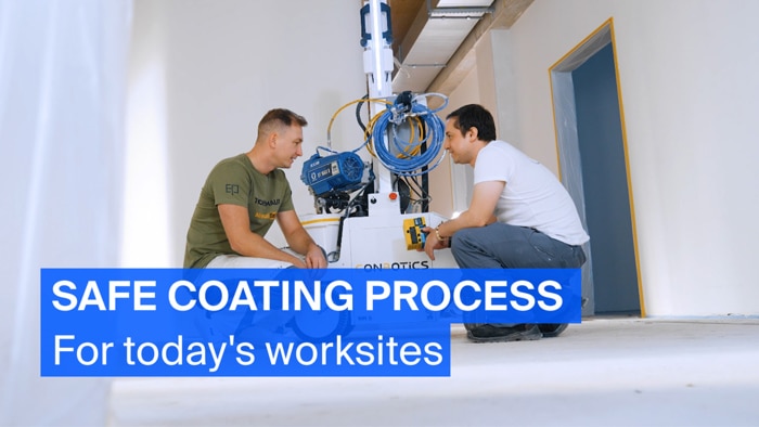 ConBotics CEO Cristian Amaya (right) explains to TechnoMaler Robert Sachs (left) how Flexi Net acts as a central logic module that consolidates all safety‑relevant sensors.