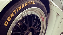 Detailed view: car tires with the Continental logo